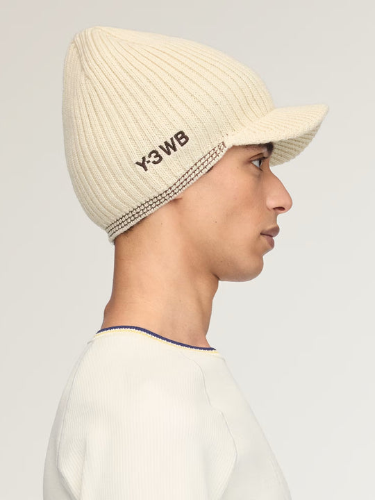 Tan hat worn by a person, showing the hat fit