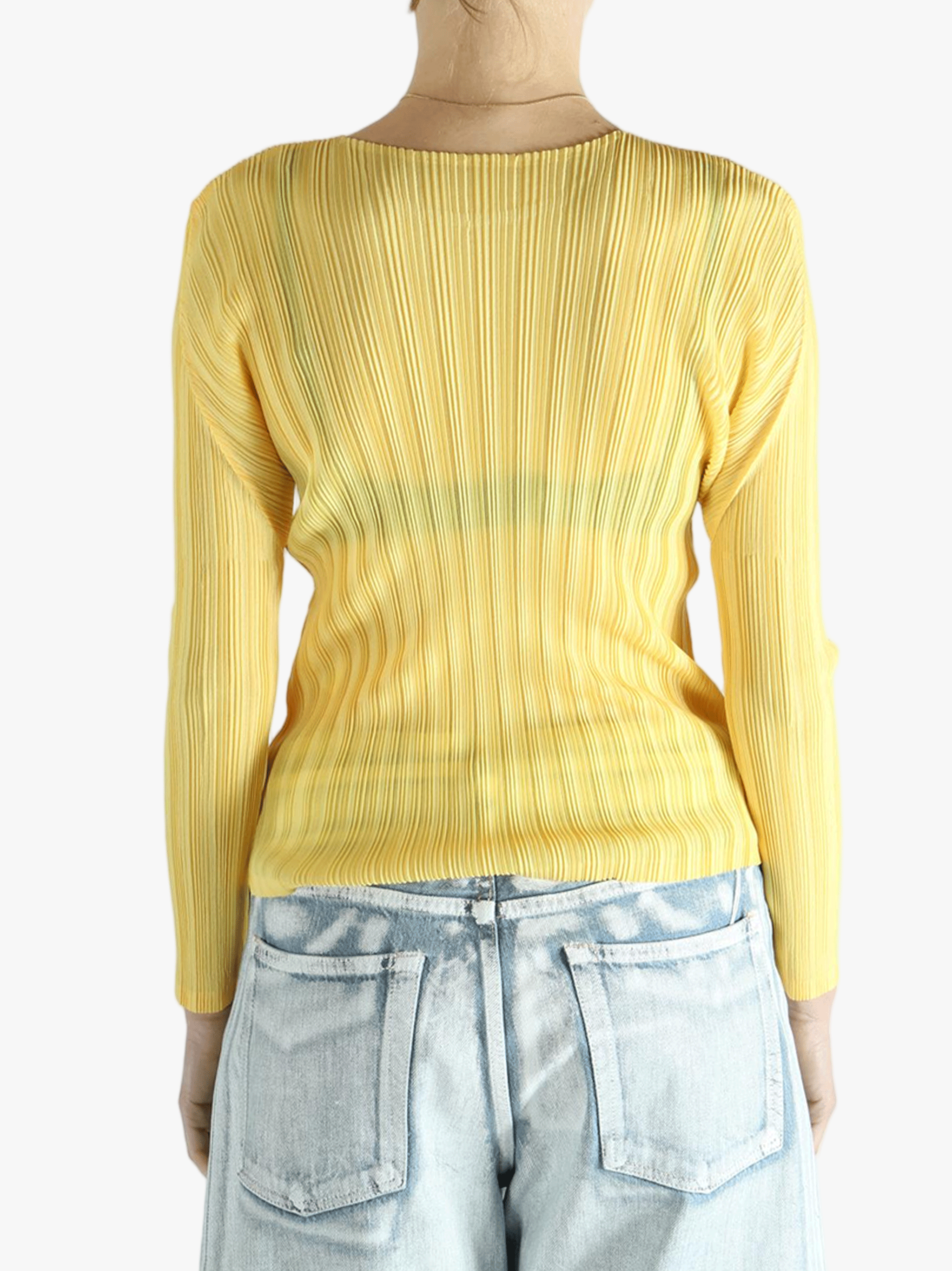 Yellow shirt worn by a person, showing the shirt's fit