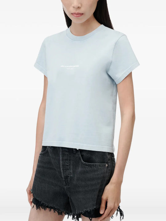 Blue t-shirt worn by a person, showing the t-shirt fit