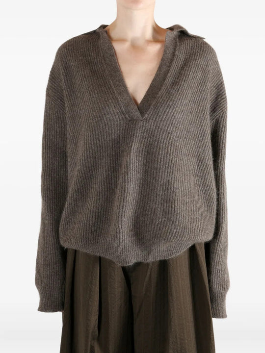 Brown top worn by a person, showing the top fit