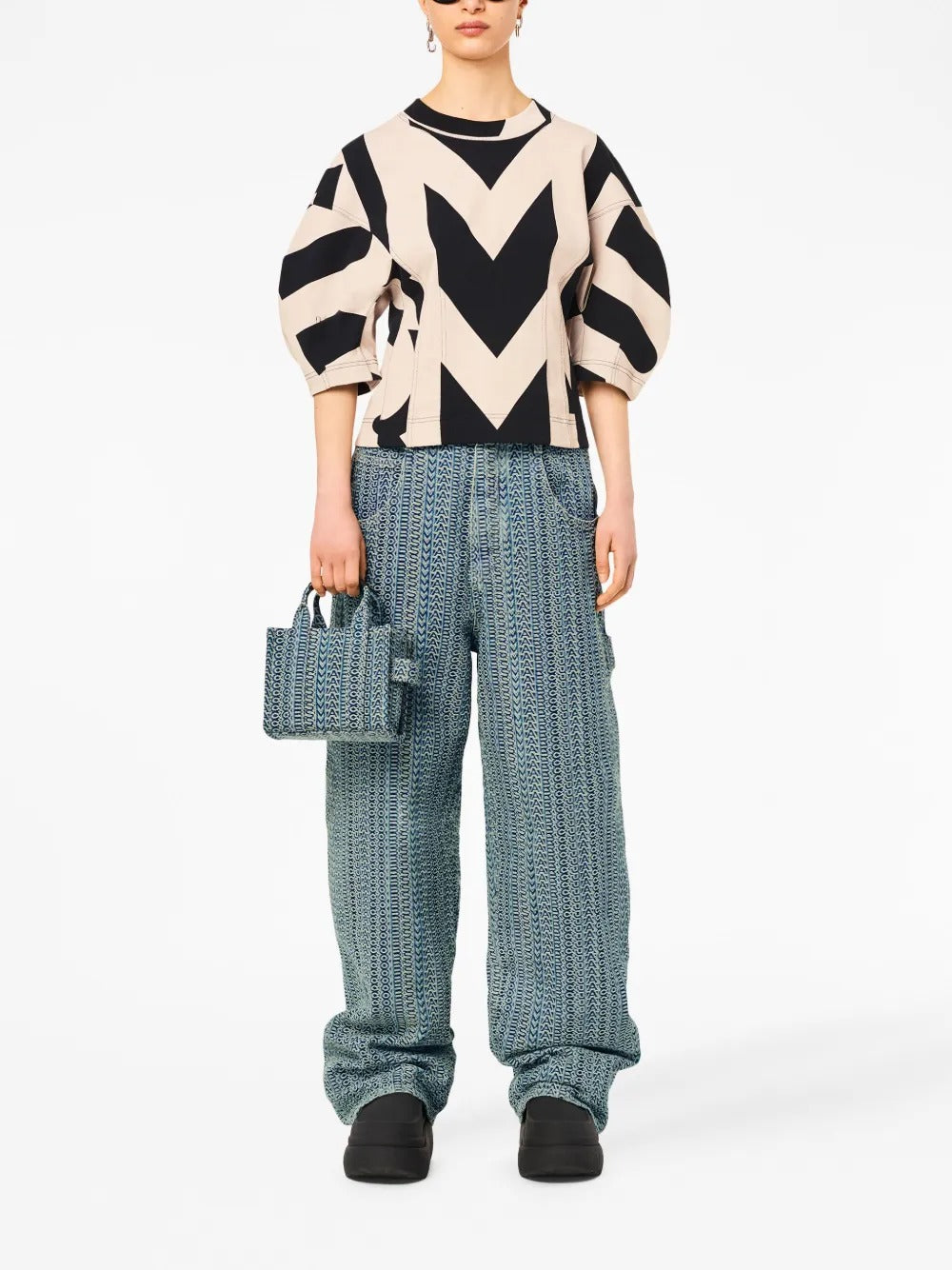 Blue bag worn by a person, showing the bag's fit