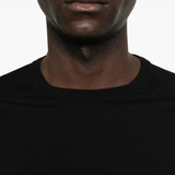 Close up of black shirt,showing texture of the cotton fabric