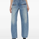 Blue jeans worn by a person, showing the jeans fit