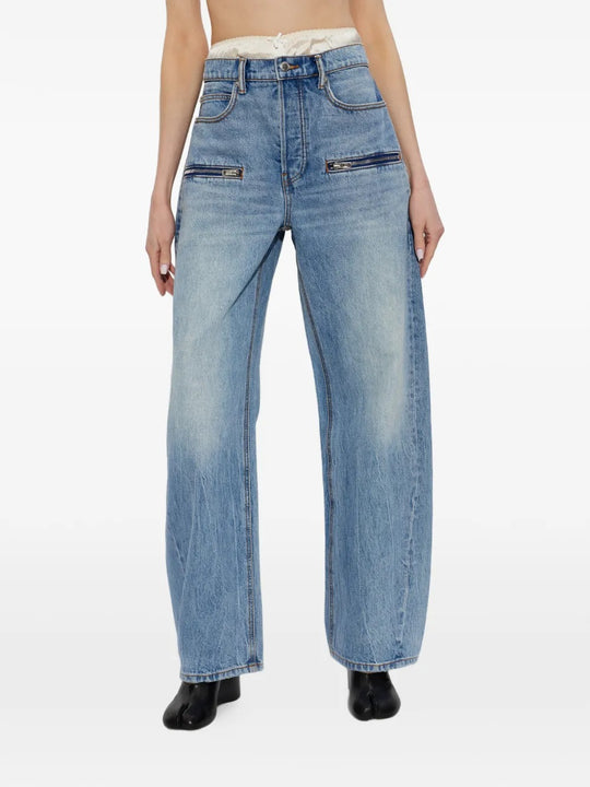 Blue jeans worn by a person, showing the jeans fit
