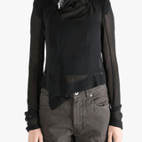 Black long sleeve worn by a person, showing the tight fit.