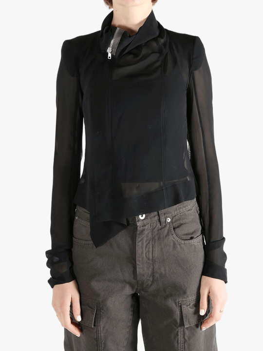 Black long sleeve worn by a person, showing the tight fit.