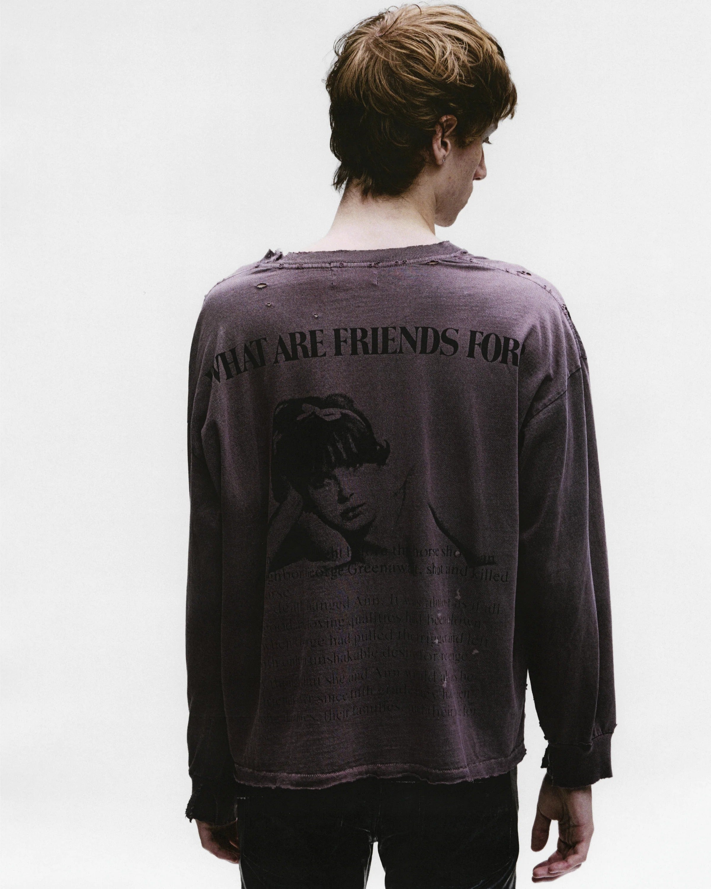 Brown t-shirt worn by a person, showing the shirt's fit