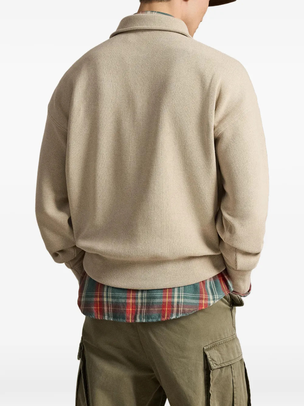 Tan top worn by a person, showing the top fit