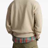 Tan top worn by a person, showing the top fit