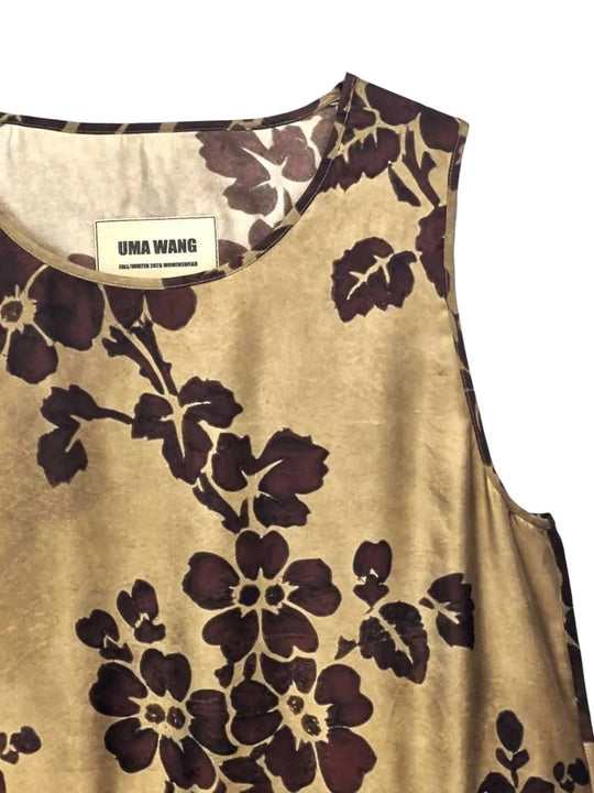 Close up of Brown dress, showing texture of the 50% viscose/ 50% cupro fabric
