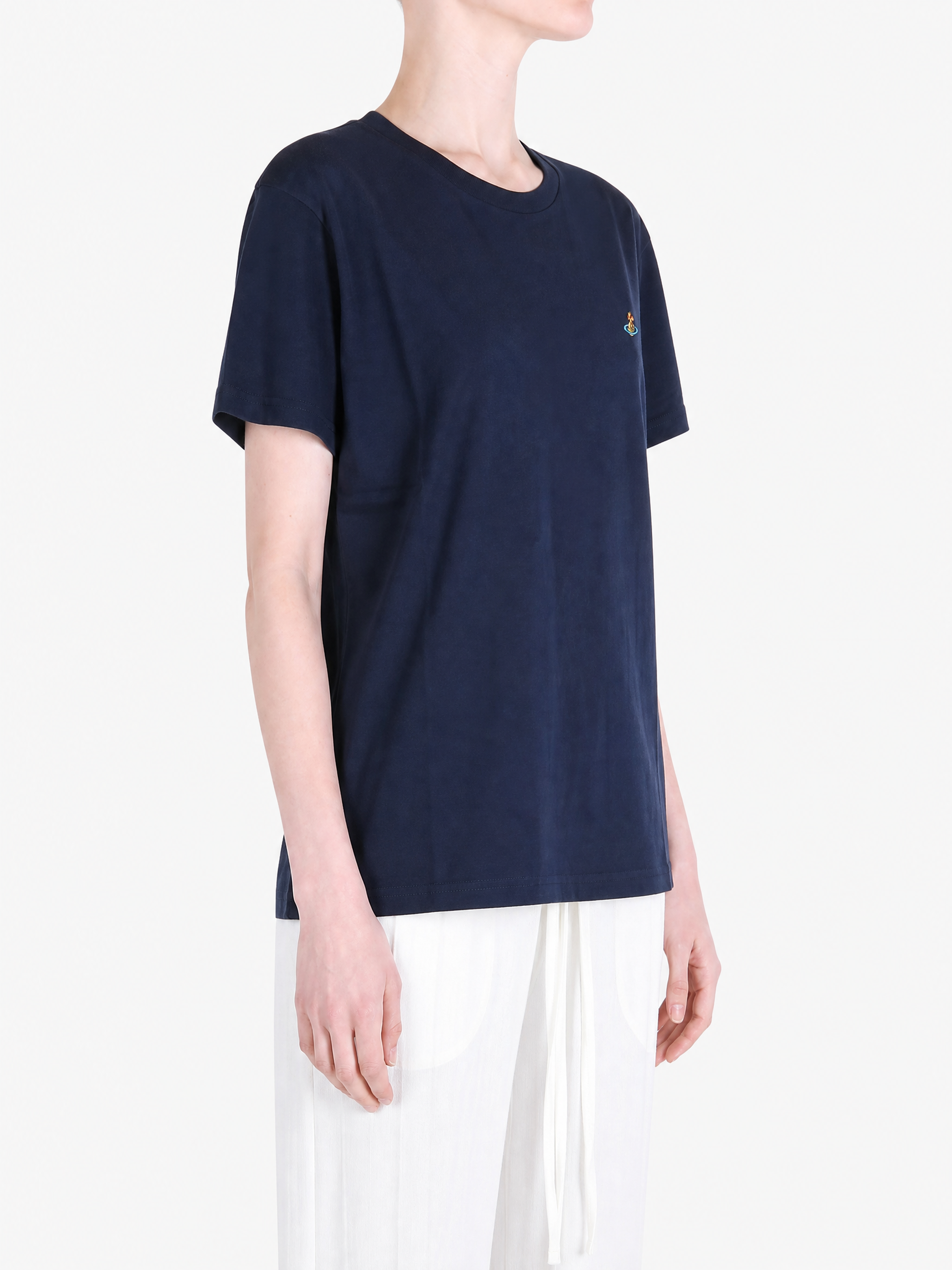 Navy shirt worn by a person, showing the shirt fit