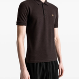 Brown t-shirt worn by a person, showing the t-shirt fit