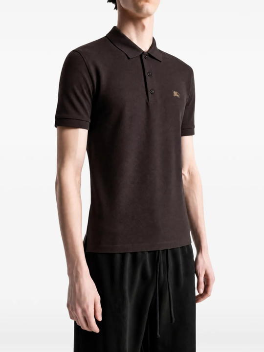 Brown t-shirt worn by a person, showing the t-shirt fit