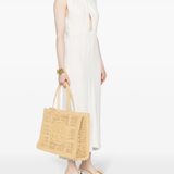Tan bags, full body view