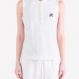 White top worn by a person, showing the top fit