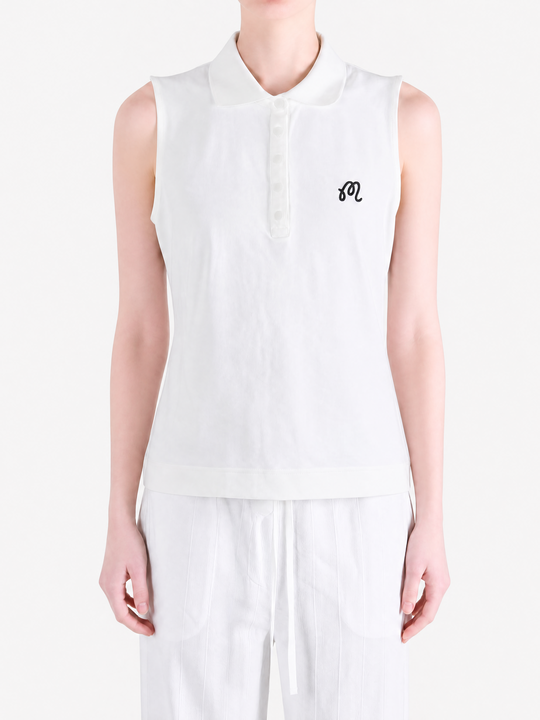 White top worn by a person, showing the top fit