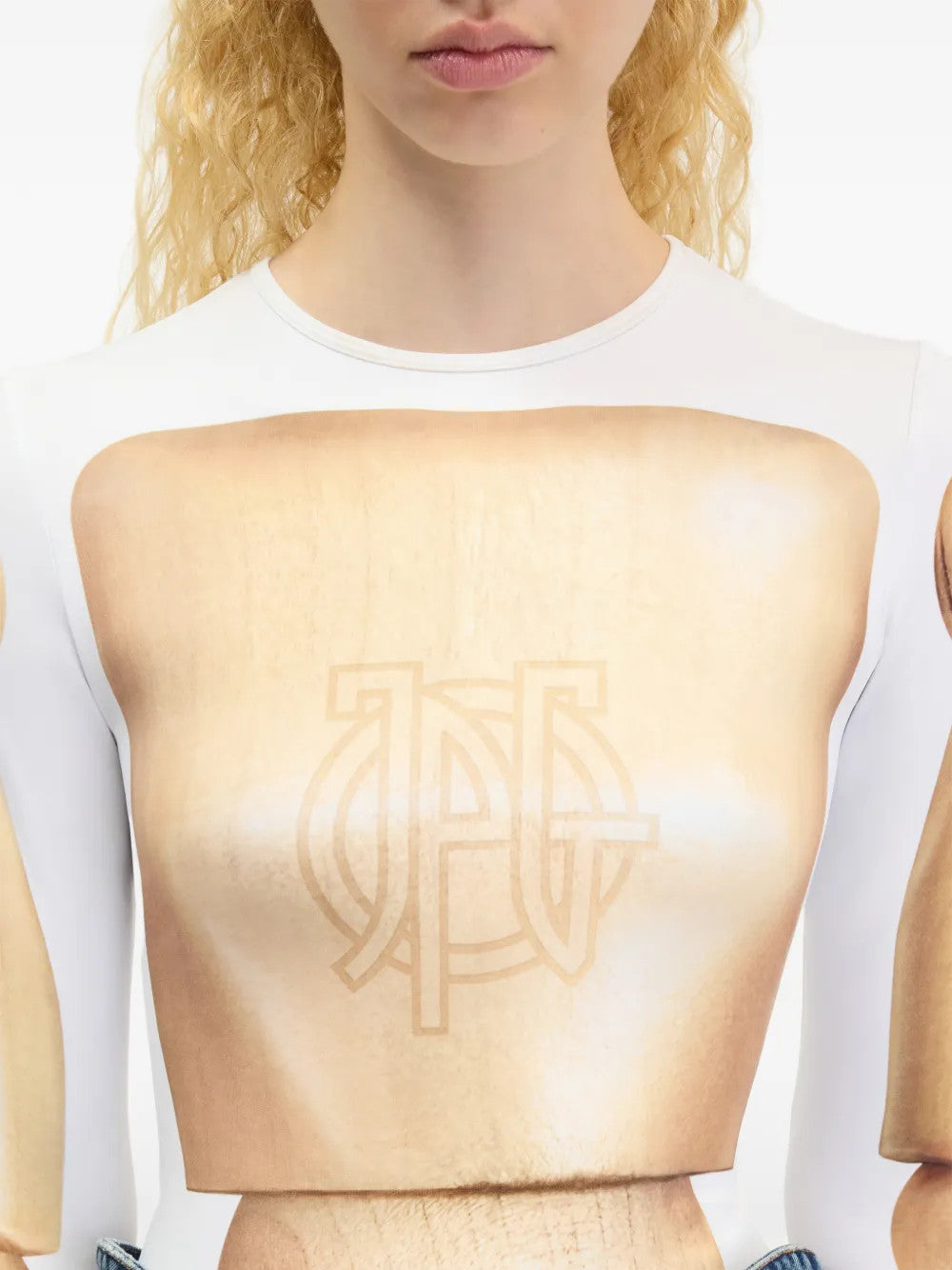 Tan top worn by a person, showing the top fit