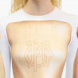 Tan top worn by a person, showing the top fit
