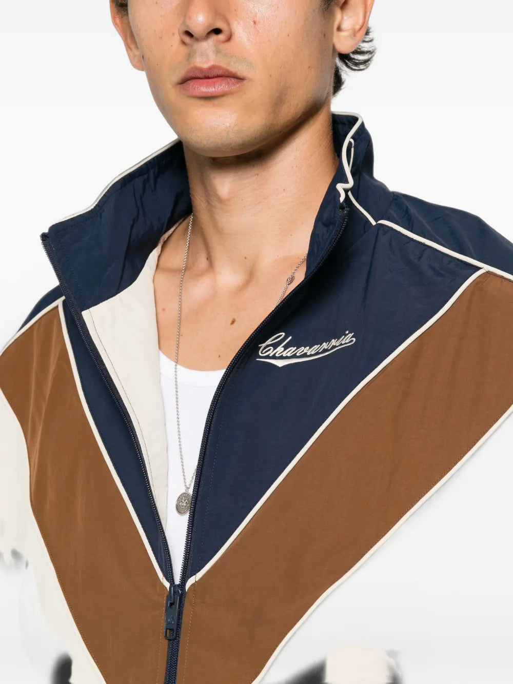Navy jacket worn by a person, showing the jacket fit
