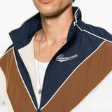 Navy jacket worn by a person, showing the jacket fit