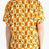 Orange shirt worn by a person, showing the shirt's fit