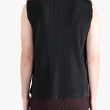 Black vest worn by a person, showing the vests fit