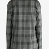 Grey shirt worn by a person, showing the shirt's fit