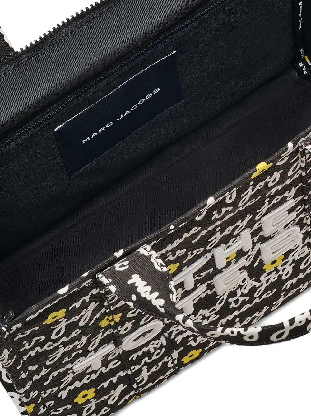 Close up of black bag, showing texture of the fabric