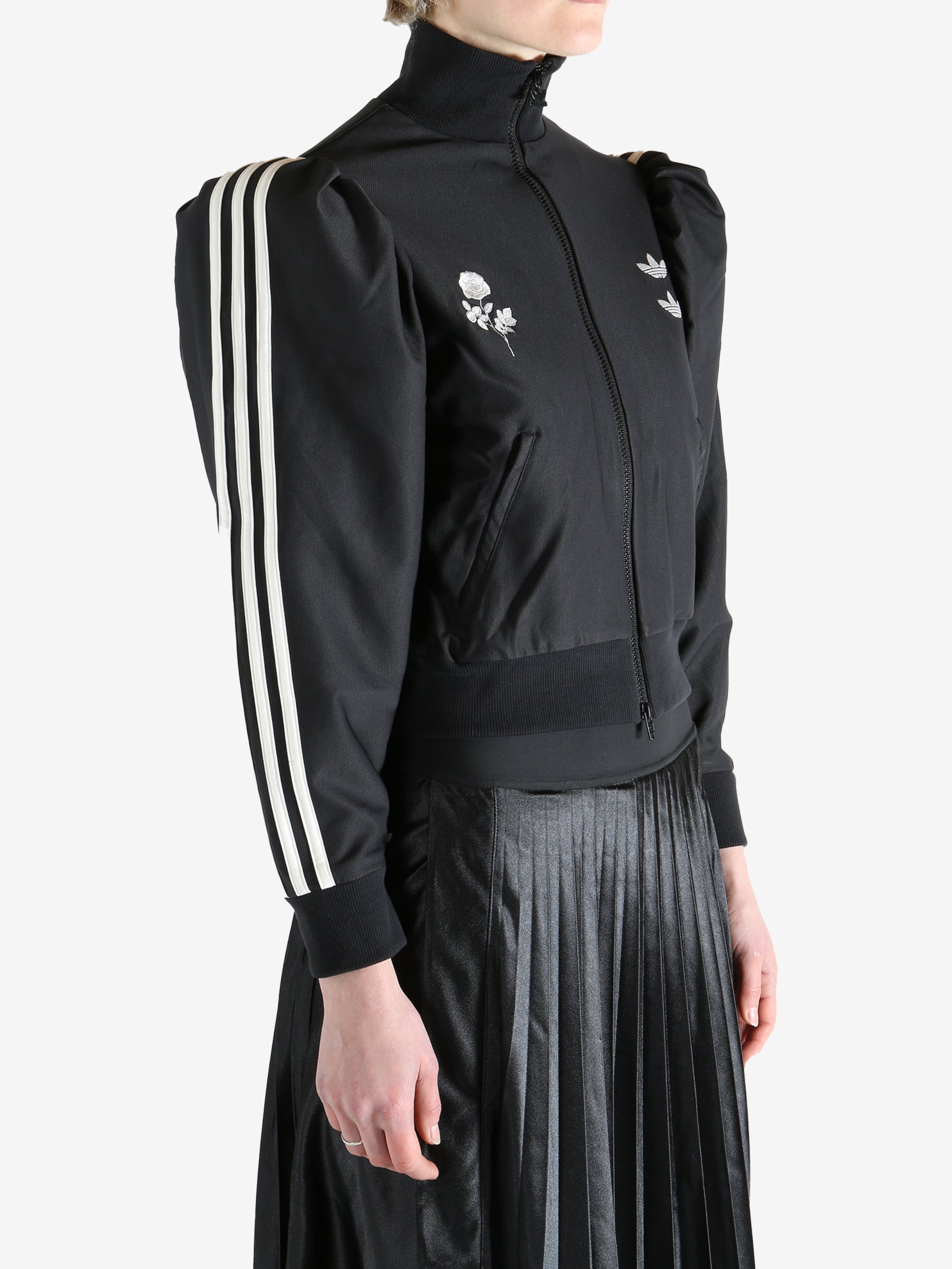 Black blouse worn by a person, showing the blouse's fit