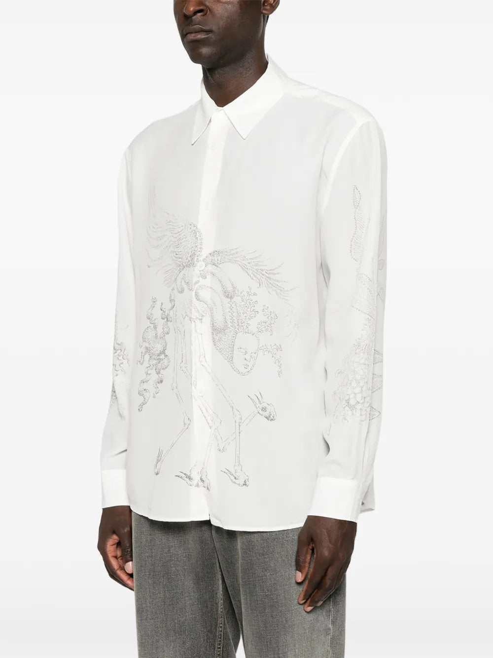 White shirt worn by a person, showing the shirt fit