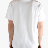 White t-shirts worn by a person, showing the t-shirts fit