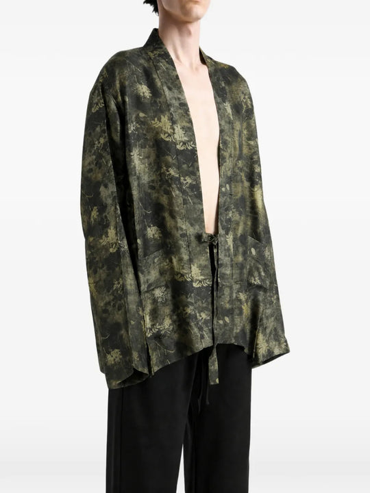 Green jacket worn by a person, showing the jacket fit