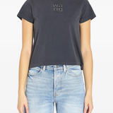 black t-shirt worn by a person, showing the t-shirt fit