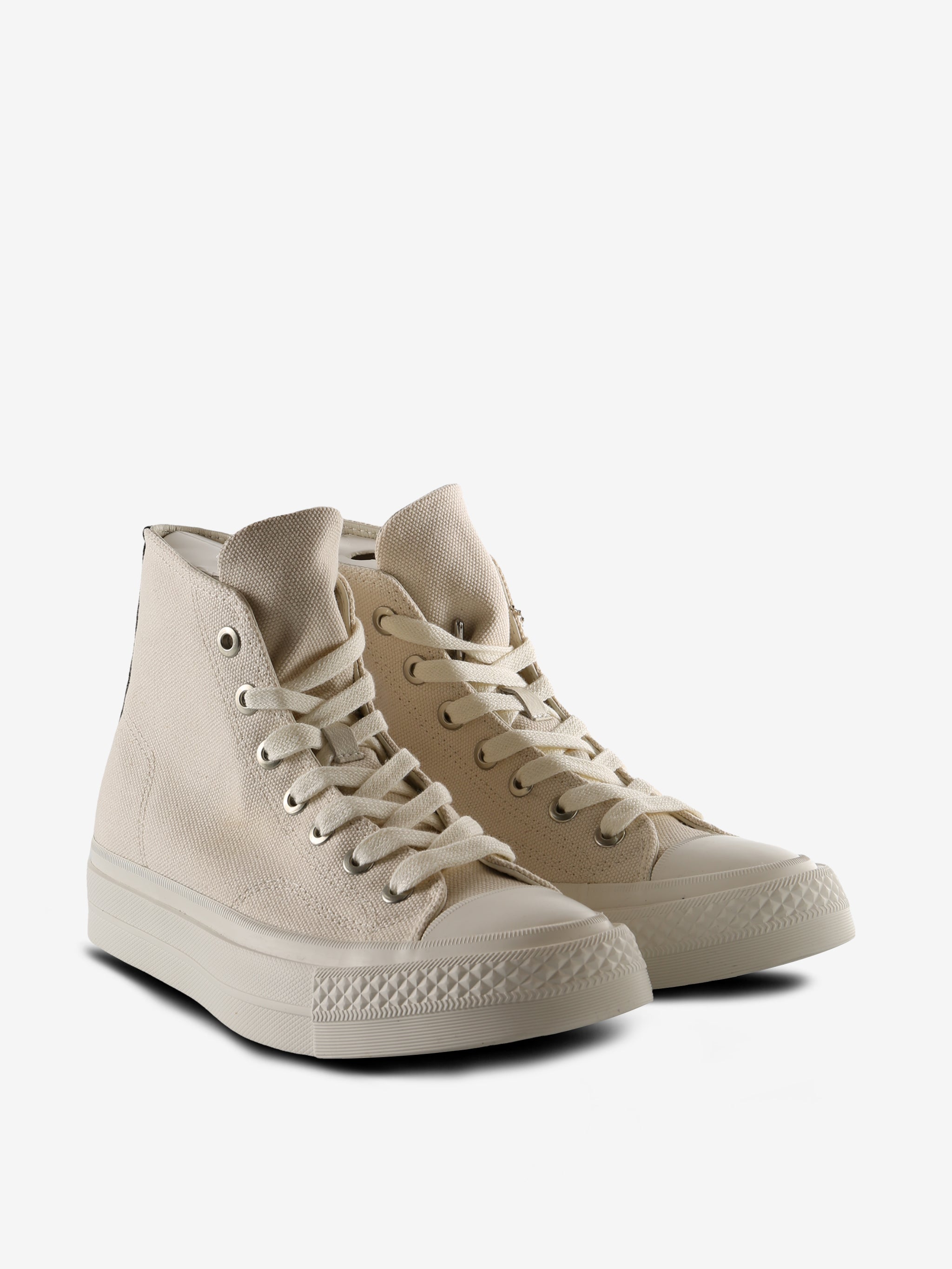 Tan sneakers,side view