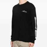 Black t-shirt worn by a person, showing the shirt's fit