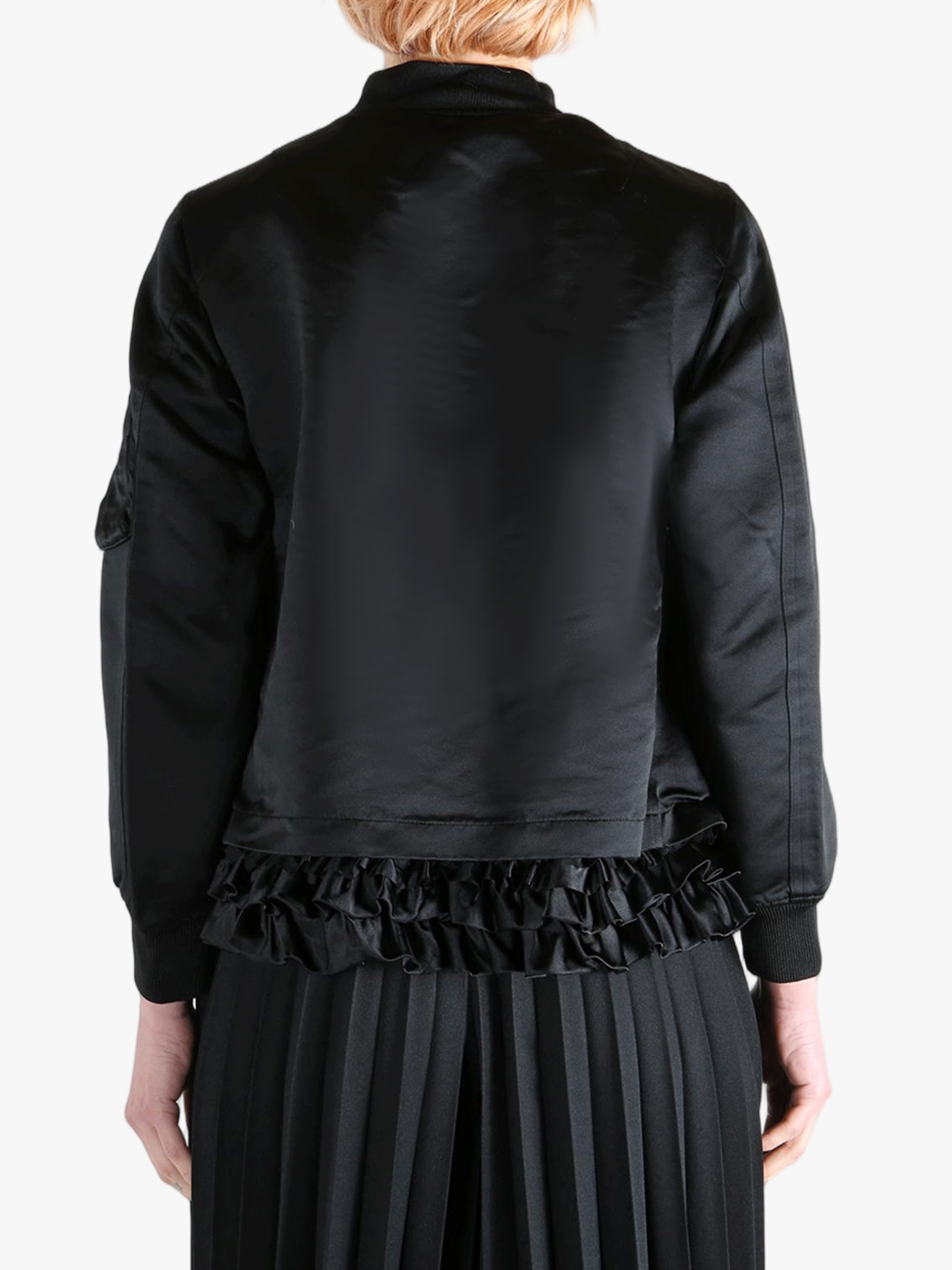 Black jacket worn by a person, showing the jacket's fit