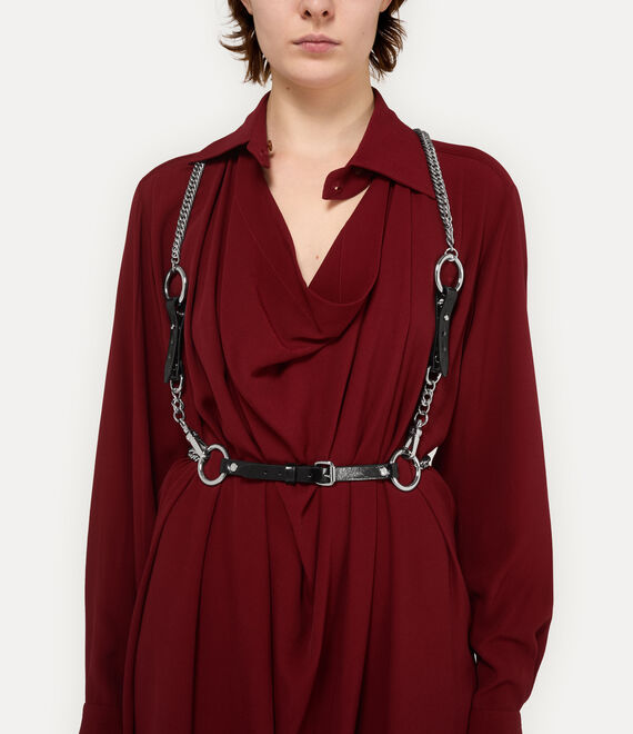 Black accessories worn by a person, showing the accessories fit