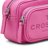 Close up of pink bag, showing texture of the leather fabric