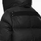 Black jacket worn by a person, showing the jacket fit