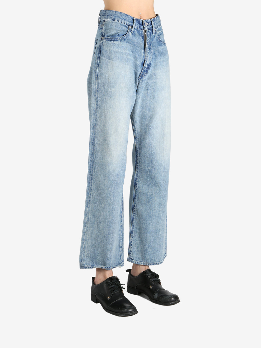 Blue pant worn by a person, showing the pant's fit