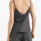 Grey tops worn by a person, showing the tops fit