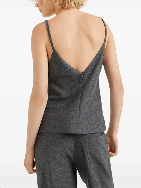 Grey tops worn by a person, showing the tops fit