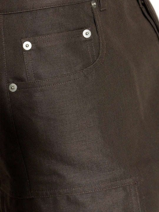 Close up of brown pants, showing texture of the polyamide and cotton fabric