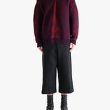 Red sweater, full body view