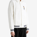 White jacket worn by a person, showing the jacket fit