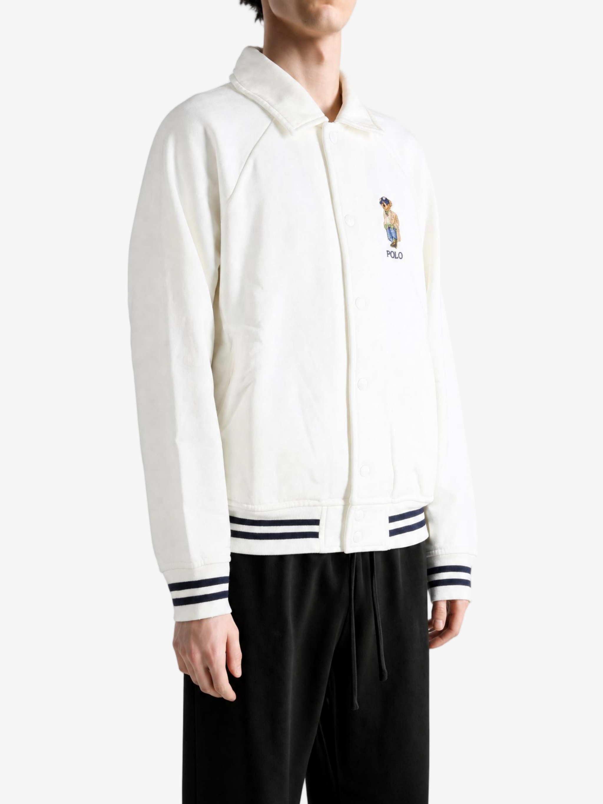 White jacket worn by a person, showing the jacket fit