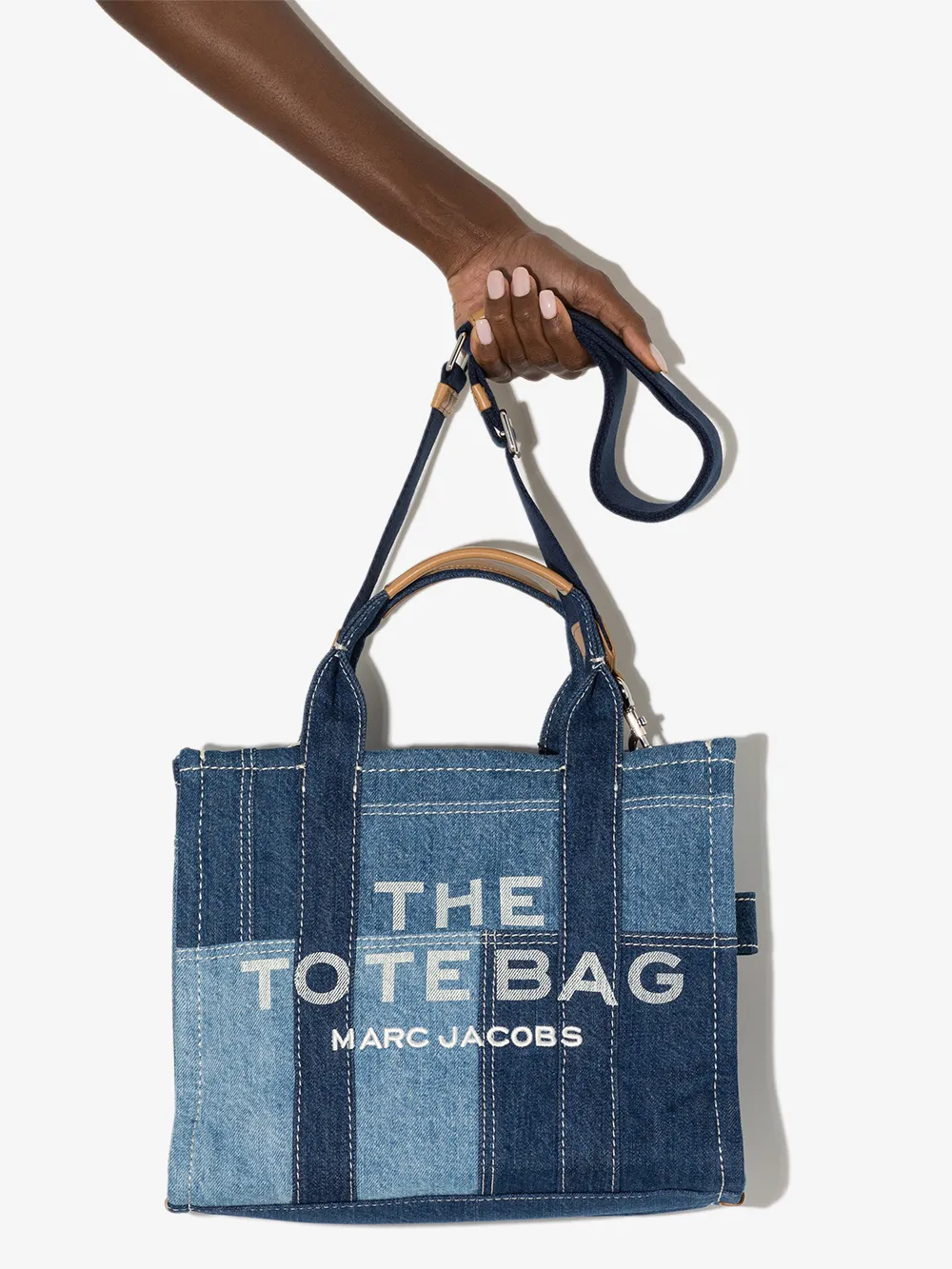 Blue bag worn by a person, showing the bag's fit