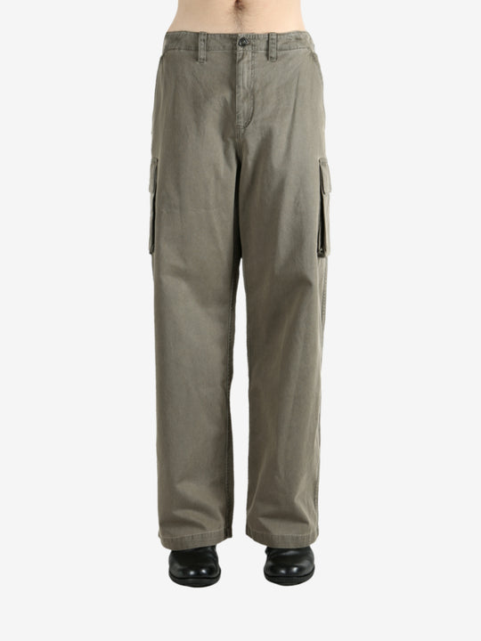 Tan pants worn by a person, showing the pants' fit