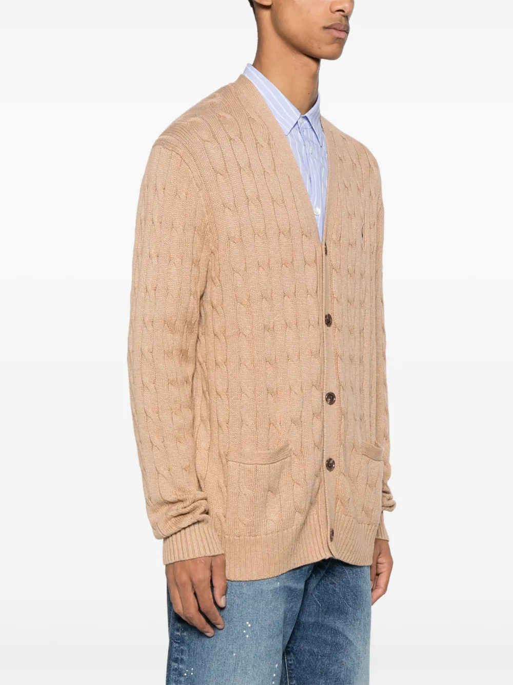 Tan cardigan worn by a person, showing the cardigan fit