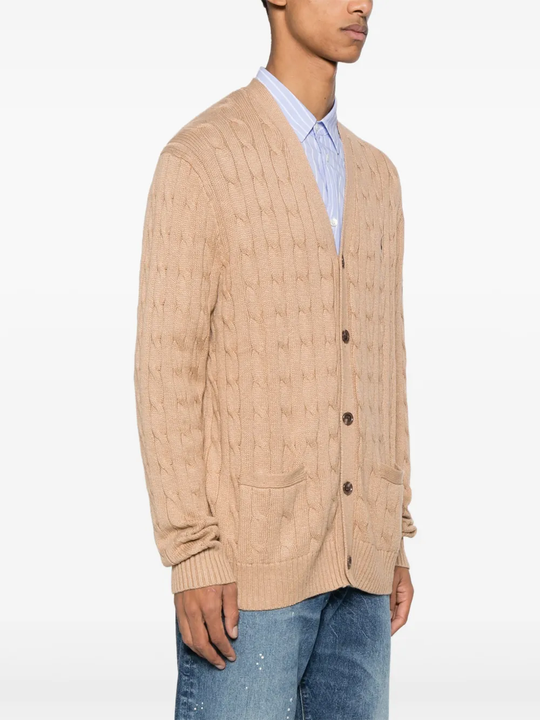 Tan cardigan worn by a person, showing the cardigan fit